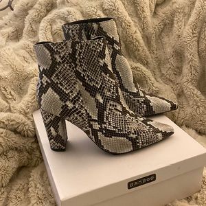 Ladies snake print booties, block heel. Never worn(NWT).